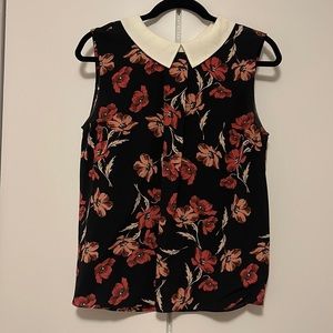 Sleeveless, collared blouse
